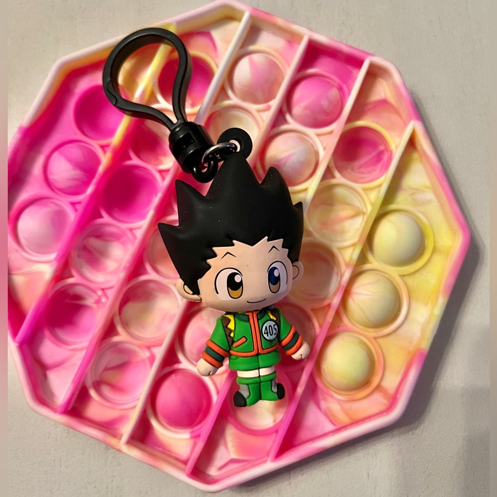 Pink Pop-it and Hunter X Hunter key chain